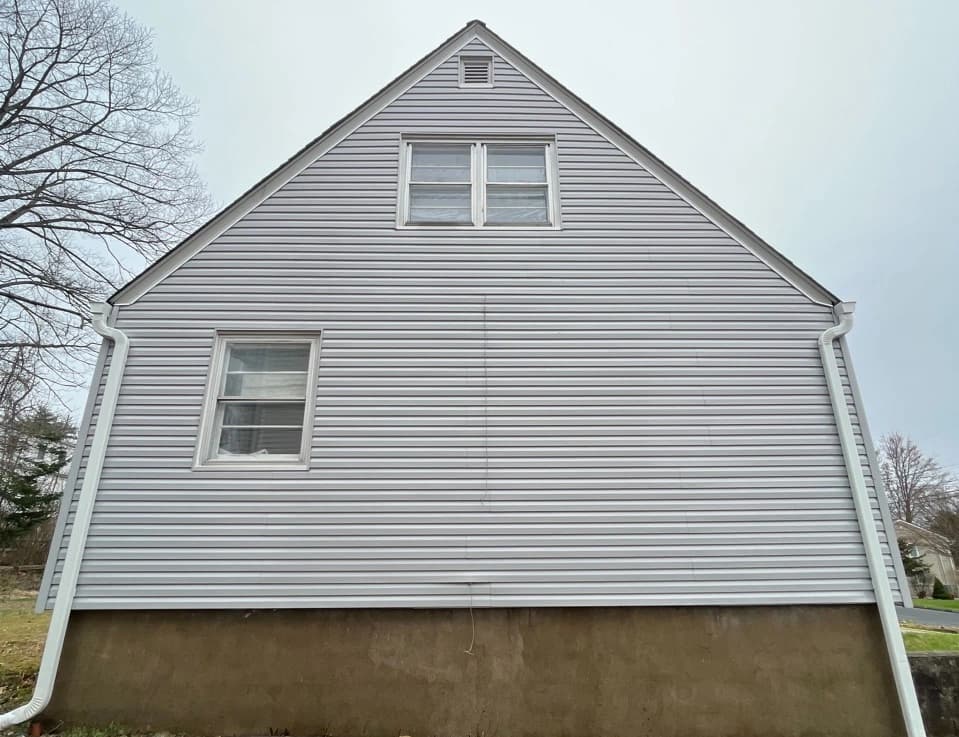 Berea Power Washing technician performing detailed house washing in Berea residential area